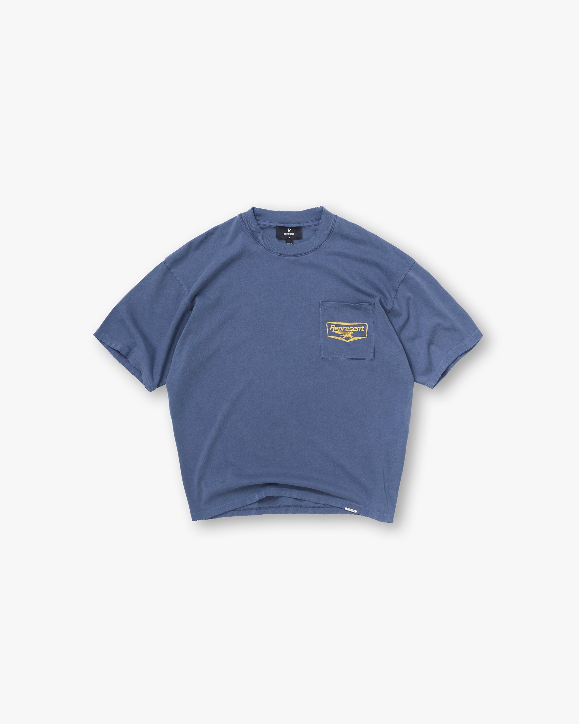 Represent Nothing Faster T-Shirt - Indigo featuring a chest pocket with yellow branding and a vintage wash.